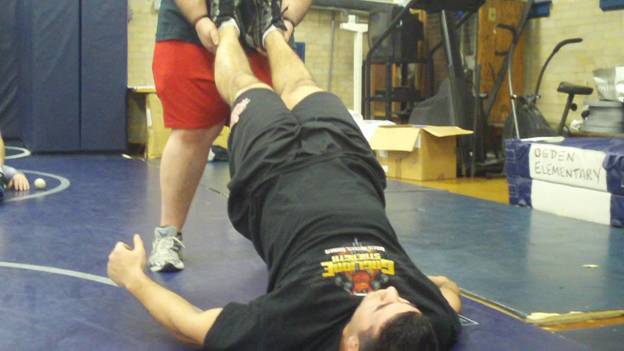 C:\Users\John\Desktop\Hewlett Wrestling Strength\pics\Wrestling Injury Prevention Partner Glute Bridge Series Frame - 618.jpg