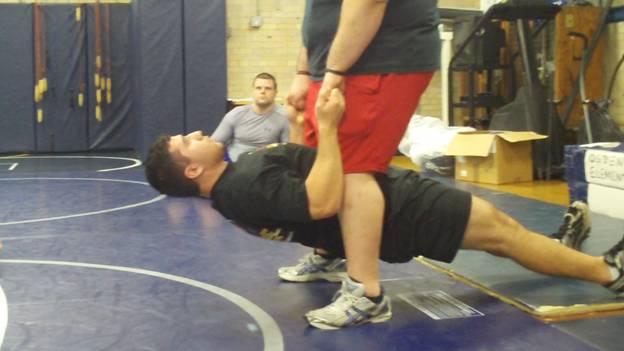 C:\Users\John\Desktop\Hewlett Wrestling Strength\pics\Wrestling Injury Prevention Parter Row Series Frame - 1556.jpg