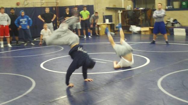 C:\Users\John\Desktop\Hewlett Wrestling Strength\pics\Wrestling Training Tips How to  Improve your  scrambles with Gymnastics Roll series Frame - 737.jpg