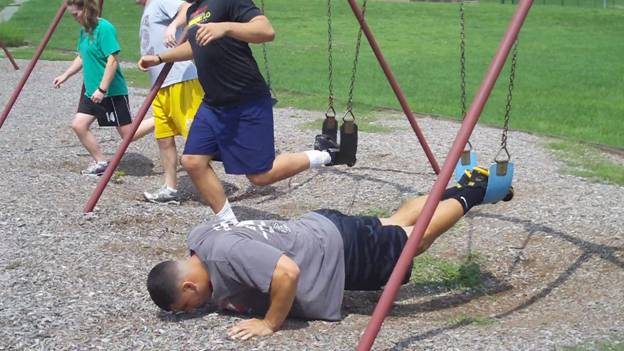 C:\Users\John\Desktop\VHW movies\Play Ground Workouts\Swing Atomic Push Up Frame - 23.jpg
